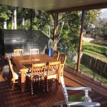 Merbau deck, aluminium screen, glass rails & an insulated colorbond roof